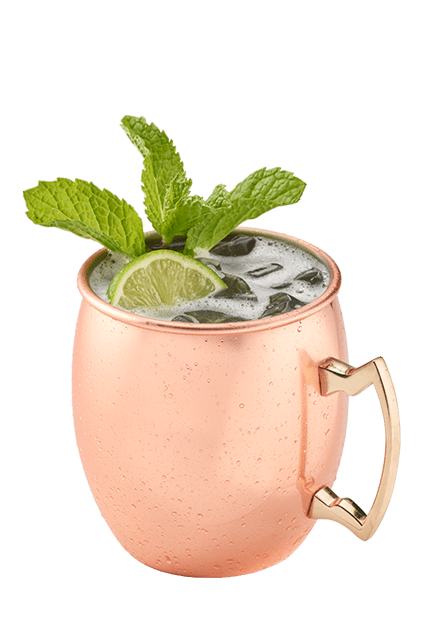 A mule cocktail in a copper mug with a lime wedge and mint garnish